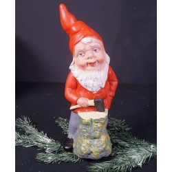 Tall, old ceramic elf with...