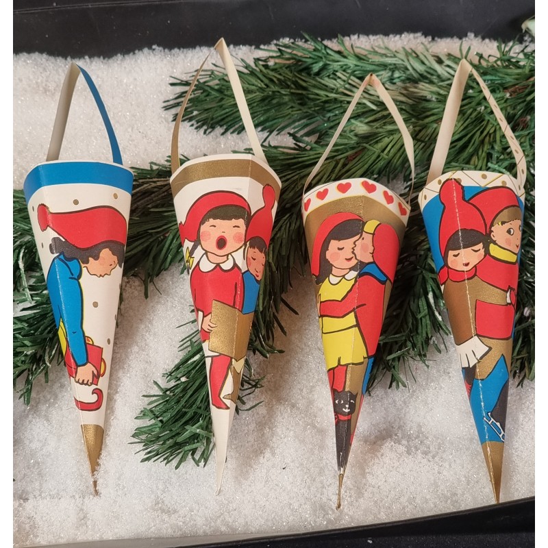 4 old candycontainers with elves, h: 21 cm.