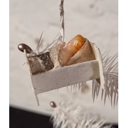 Antique cardboard ornament/Mica with wax doll in cradle, size: 4,5 x 3 cm.