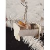 Antique cardboard ornament/Mica with wax doll in cradle, size: 4,5 x 3 cm.