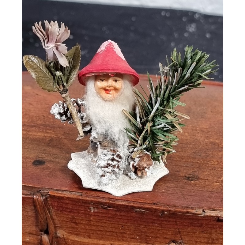 Old pinecone elf with snow on the hat, h: 6,5 cm.