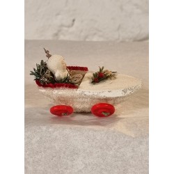 Snowchild in pine cone wagon, size: 8 x 5,5 cm.