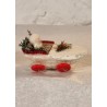 Snowchild in pine cone wagon, size: 8 x 5,5 cm.