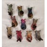 10 antique candle holders, colored fish, size: 4 x 2,5 cm.