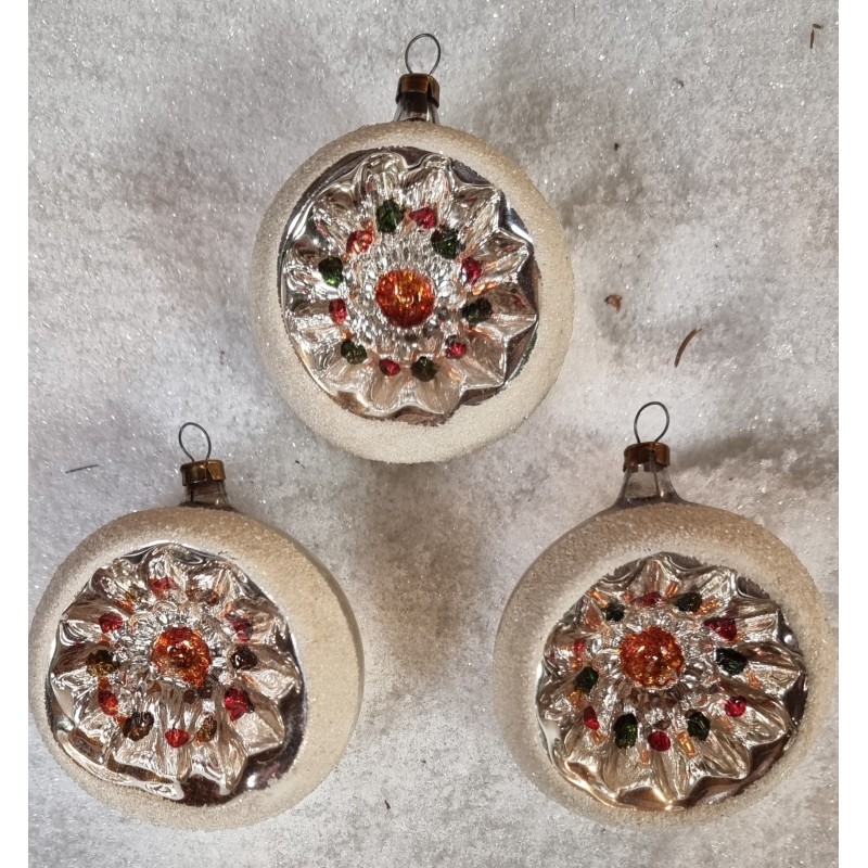 Antique, tall reflectors with star pattern, h: 7 cm.