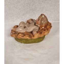 Old crib with Jesus child, size: 9 x 6,5 cm.