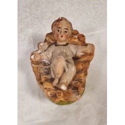 Old crib with Jesus child, size: 9 x 6,5 cm.