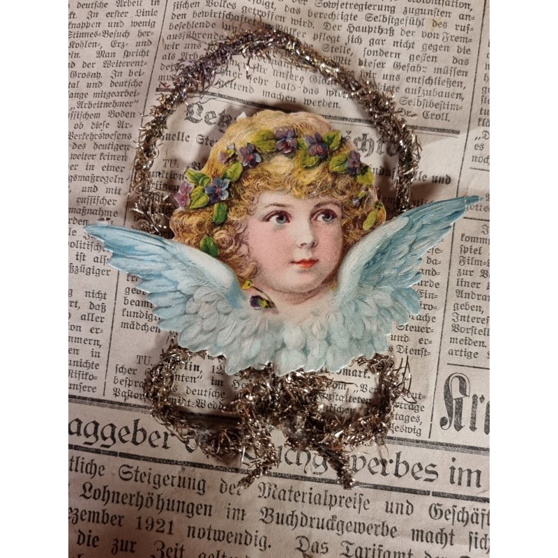 Antique tinsel ornament with angel, h: 12 cm.