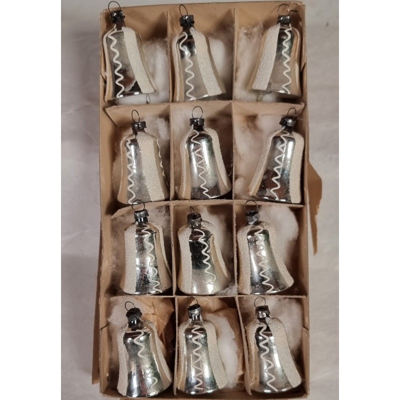 Box with old glass ornaments, silver bells with snow, h: 4,5 cm.