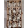 Box with old glass ornaments, silver bells with snow, h: 4,5 cm.