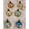 Box with antique glass ornaments, 6 spinning tops, h: 4 cm.