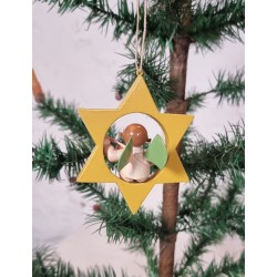 Tall Wendt und Kühn star with angel, h: 9 cm.