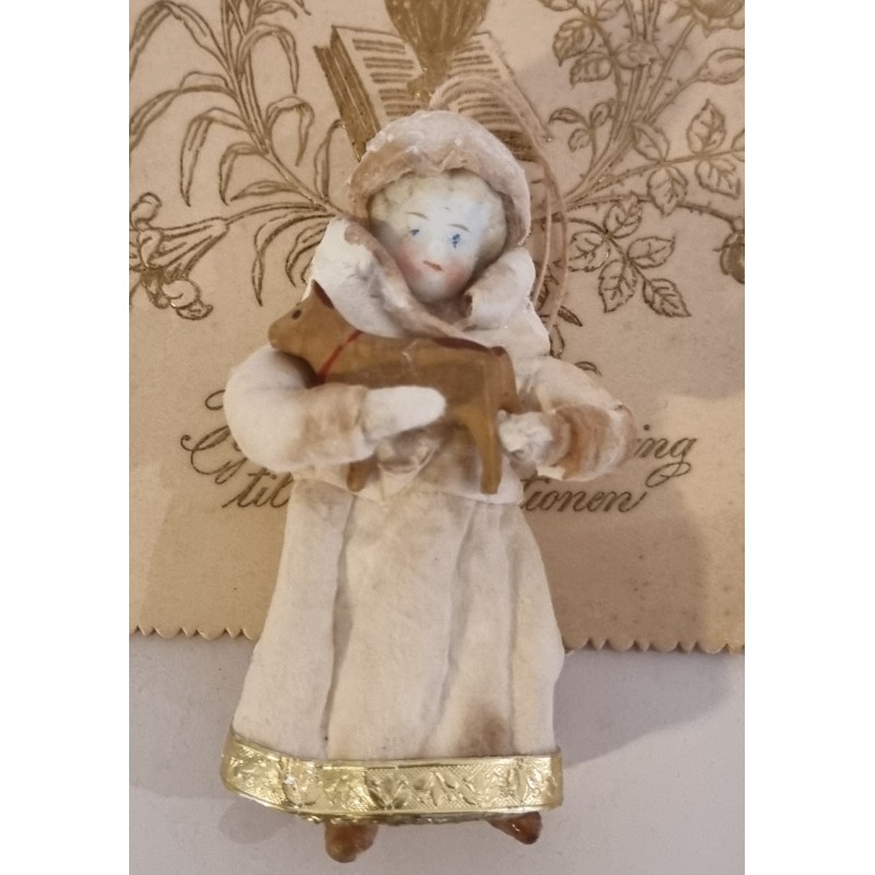 Cotton ornament, girl with antique bisquit head and dog, h: 9 cm.
