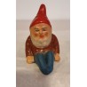 Old ceramic elf, sitting, h: 8,5 cm.