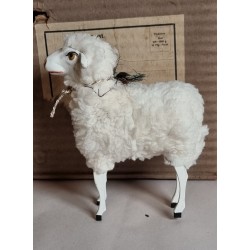 Tall sheep with blue foil flower, h: 15,5 cm.