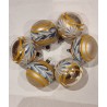 Box with old glass ornaments with motive, h: 5 cm.