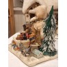 Display in cotton with Santa and Christmas presents and a music box, size: 26 cm (Santa)x 28 x 18 cm.