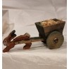 Small, antique bunny with wagon in wood/egg, size: 6 x 14 cm.