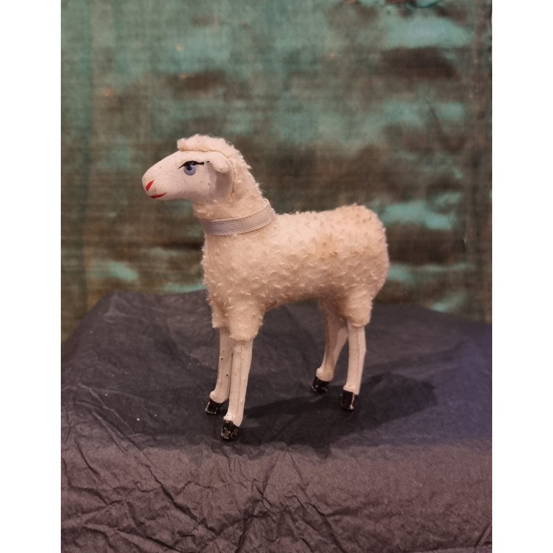 1 tall antique sheep, h: 9,5 cm.