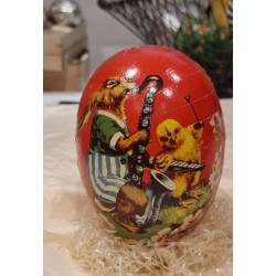 Antique cardboard Easter egg, bunny with a sax, h: 13 cm.