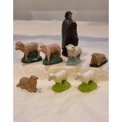 Old shepherd and 7 sheep, h: 9 cm (shepherd) 2,5 - 4,5 cm (sheep).