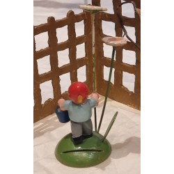 Old Wendt und Kühn figure, boy with flower and bucket, h: 6 cm. (figure).