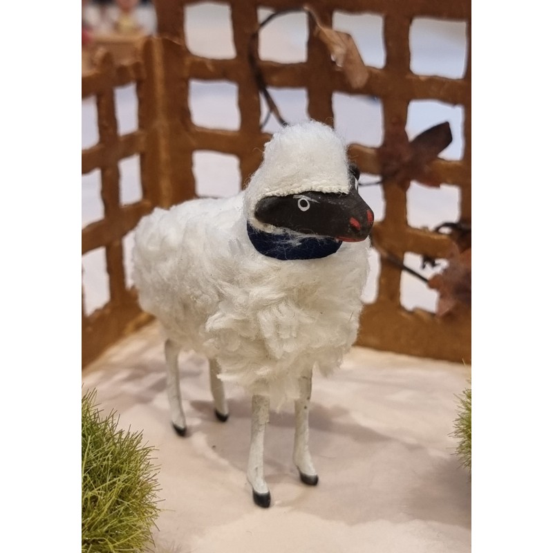 Sheep with a dark head, h: 8 cm.