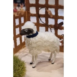 Sheep with a dark head, h: 8 cm.