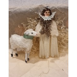 Angel in crepe, tinsel and...