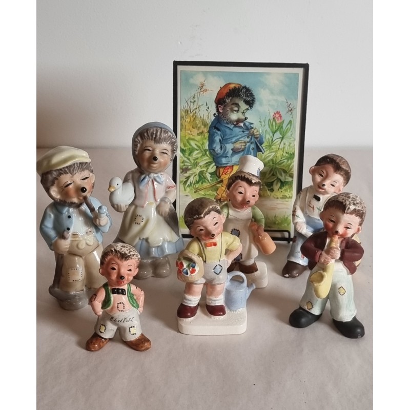 1 Mecki pic. and 7 porcelain Mecki figures, h: 16,5 cm (pic).