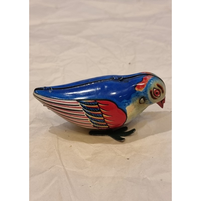 Old mechanical toy, bird, size: 4 x 7,5 cm.