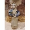 Antique ornament, antique bisquit doll with crepe and cotton clothes, h: 11,5 cm., h: