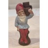 Antik gips nisse med krukke/lysholder, h: 14 cm.
