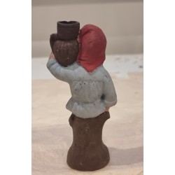 Antik gips nisse med krukke/lysholder, h: 14 cm.
