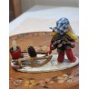Old pine cone elf with a sledge, h: 8 cm.