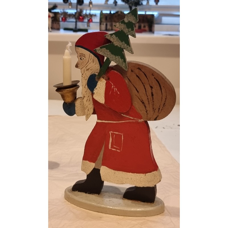Old Santa, from 1941, in wood, with sack, tree and candle, h: 27 cm.