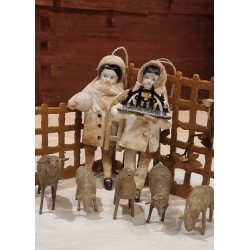 Cotton ornament, doll with antique bisquit head and sledge, h: 13 cm.