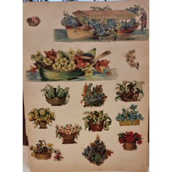 Side med antikke glansbilleder, julemænd mm., mål: 31 x 23 cm.