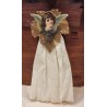 Old tinsel/crepe ornament, angel head on leaf, h: 18 cm.