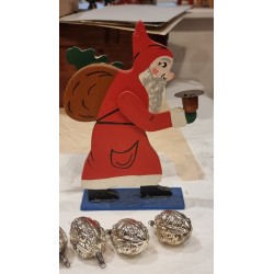 Old Santa in wood, with sack, tree and candle, h: 25,5 cm.
