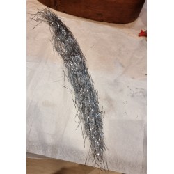 Gammelt let strimlet lametta, l: 55 cm.