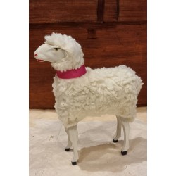 Tall sheep with pink necklace, h: 17 cm.