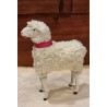 Tall sheep with pink necklace, h: 17 cm.