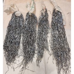 4 large bundles orig. silver tinsel, heavy, used.
