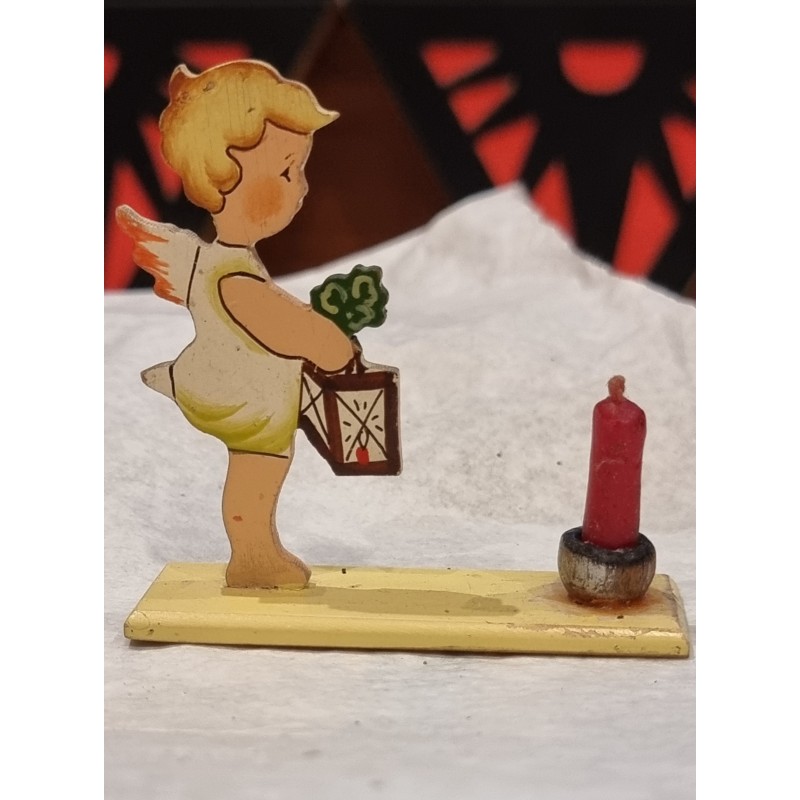 Display with an old angel, size: 6 x 6 cm.