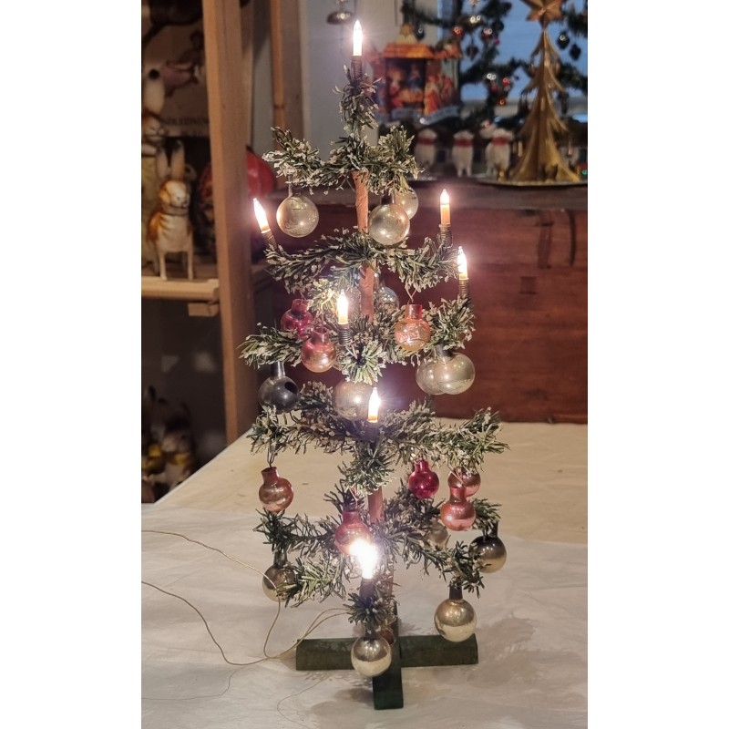 Old christmas tree, paper, with lights and pink and silver ornaments, h: 36 cm.