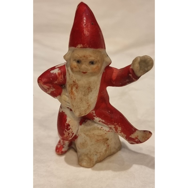 Antique bisquit elf on ice, h: 5,5 cm.
