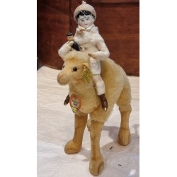 Old Steiff animal, dromedary + cotton doll with antique porcelain head, h: 20 cm.