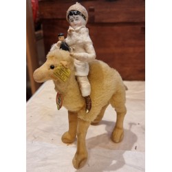 Old Steiff animal, dromedary + cotton doll with antique porcelain head, h: 20 cm.