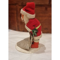 Old Santa with a sack, papier-mache head, h: 14 cm.